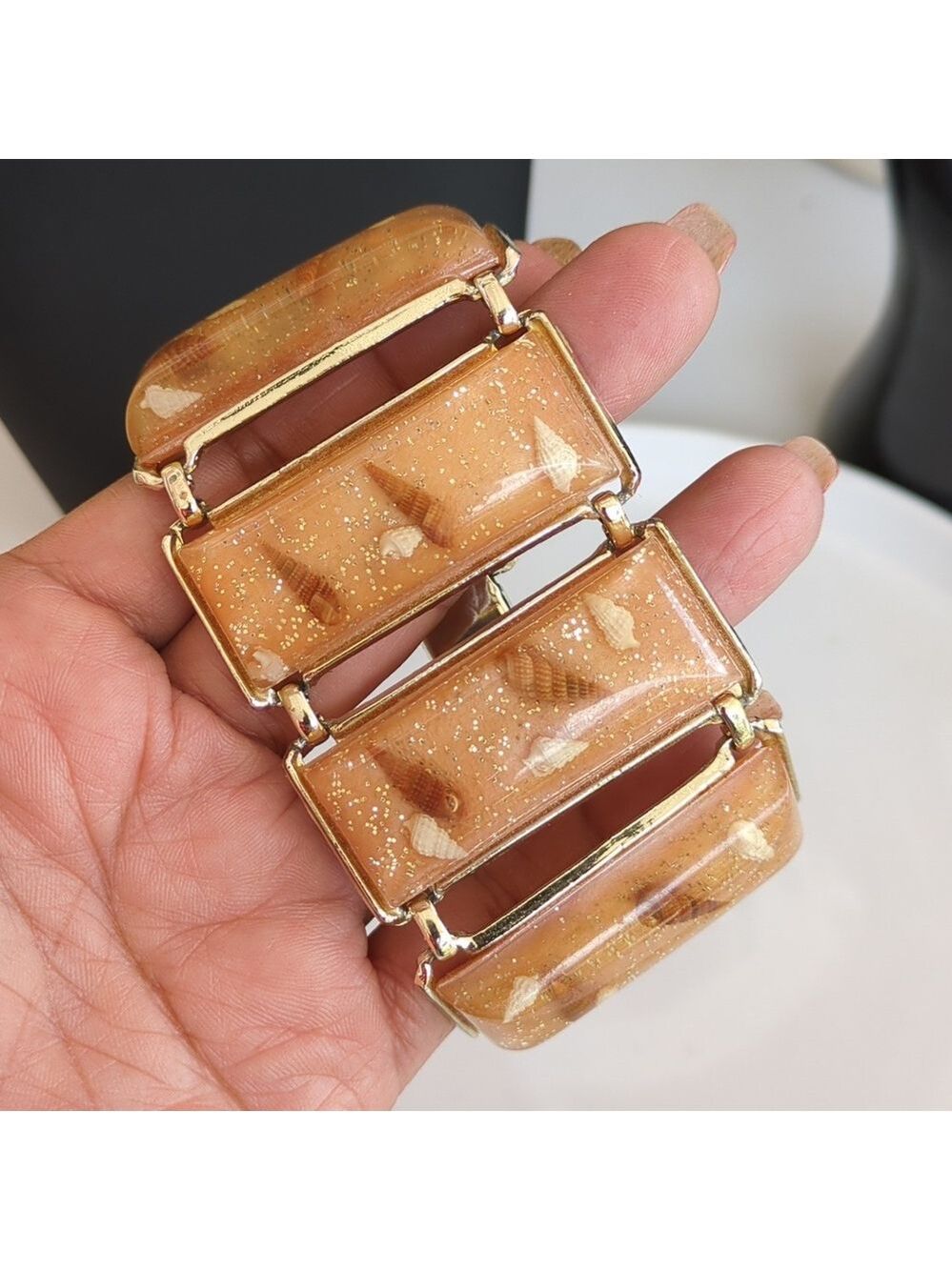 vintage Lucite panel bracelet with embedded seashells and gold glitter. 1950's